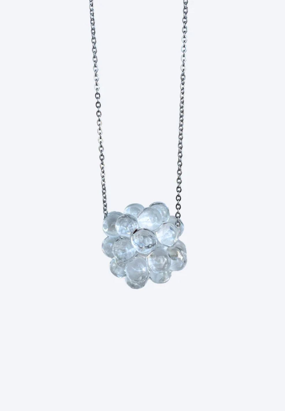 Lucent Necklace: Delicate silver chain with a 35-40mm glass ball charm filled with tiny transparent beads.