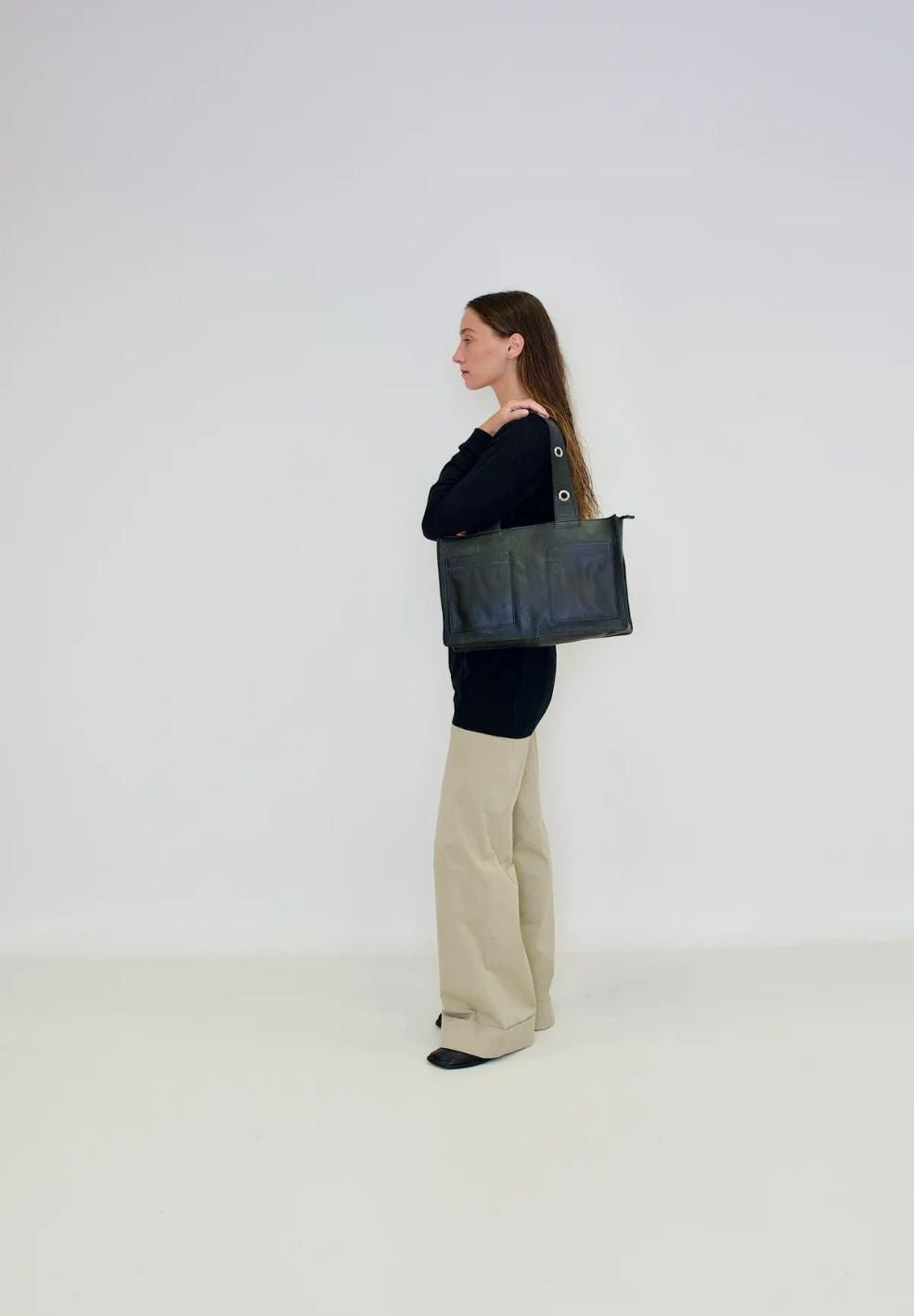 Muse Shoulder Bag Black from 100% nappa leather on model 2 | Verse Good Store
