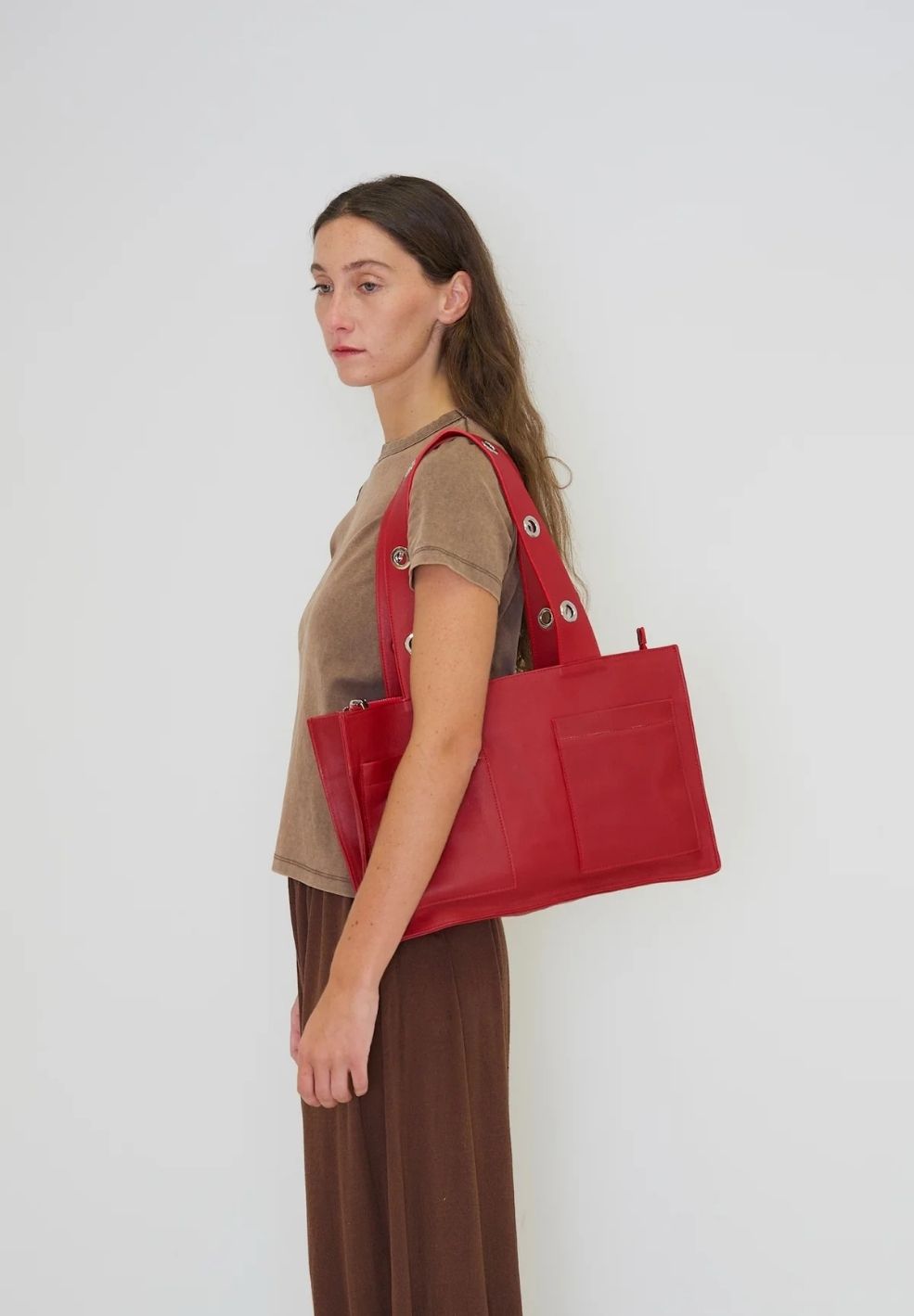 Muse Shoulder Bag Red from 100% nappa leather on model 1 | Verse Good Store