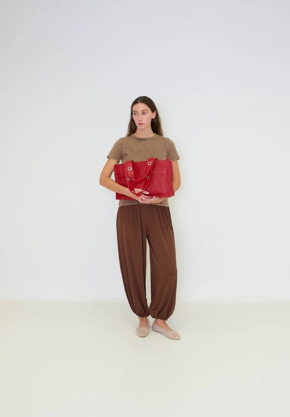 Muse Shoulder Bag Red from 100% nappa leather on model 2 | Verse Good Store