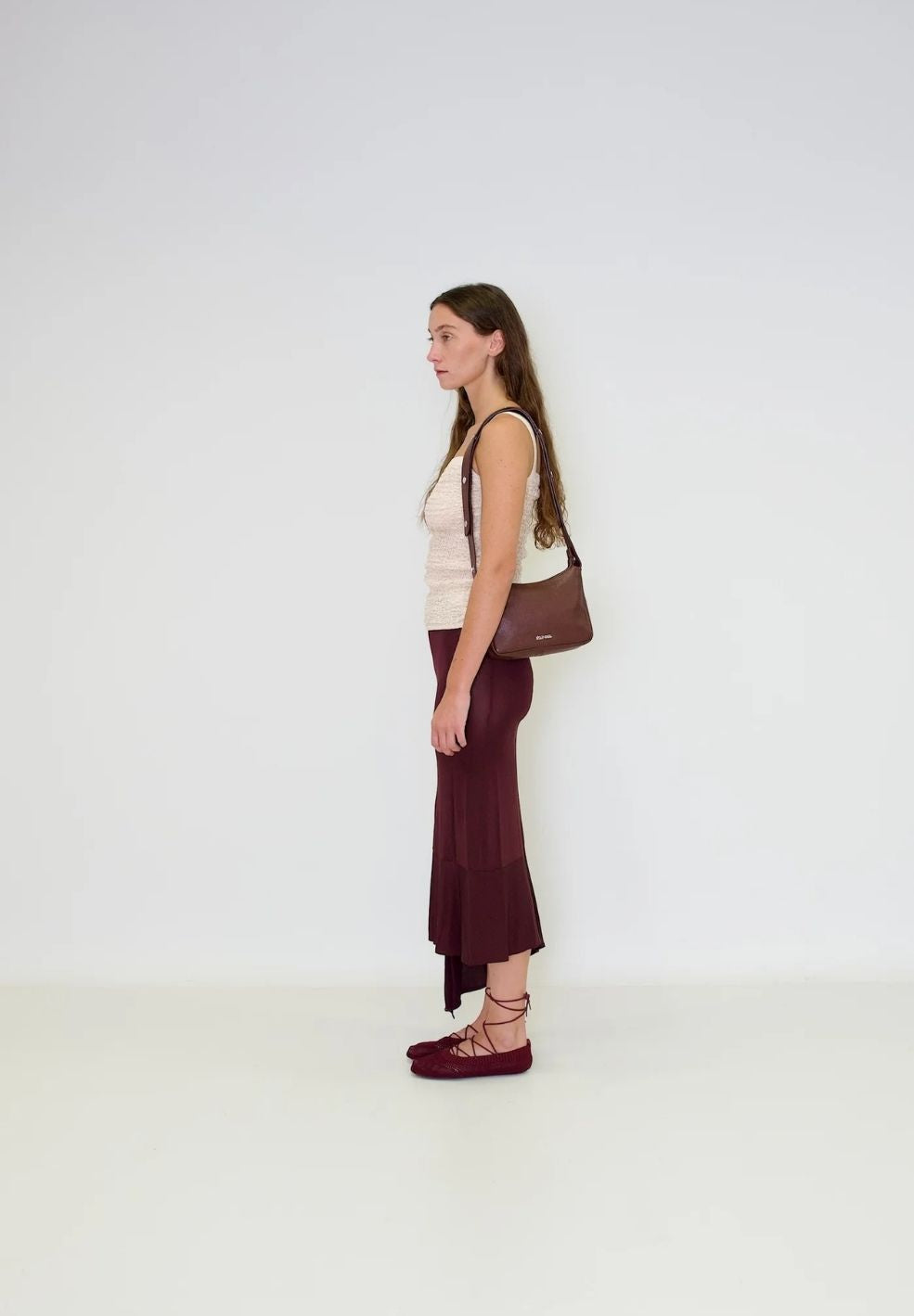 Tika Small Bag Brown from 100% nappa leather on model 1 | Verse Good Store
