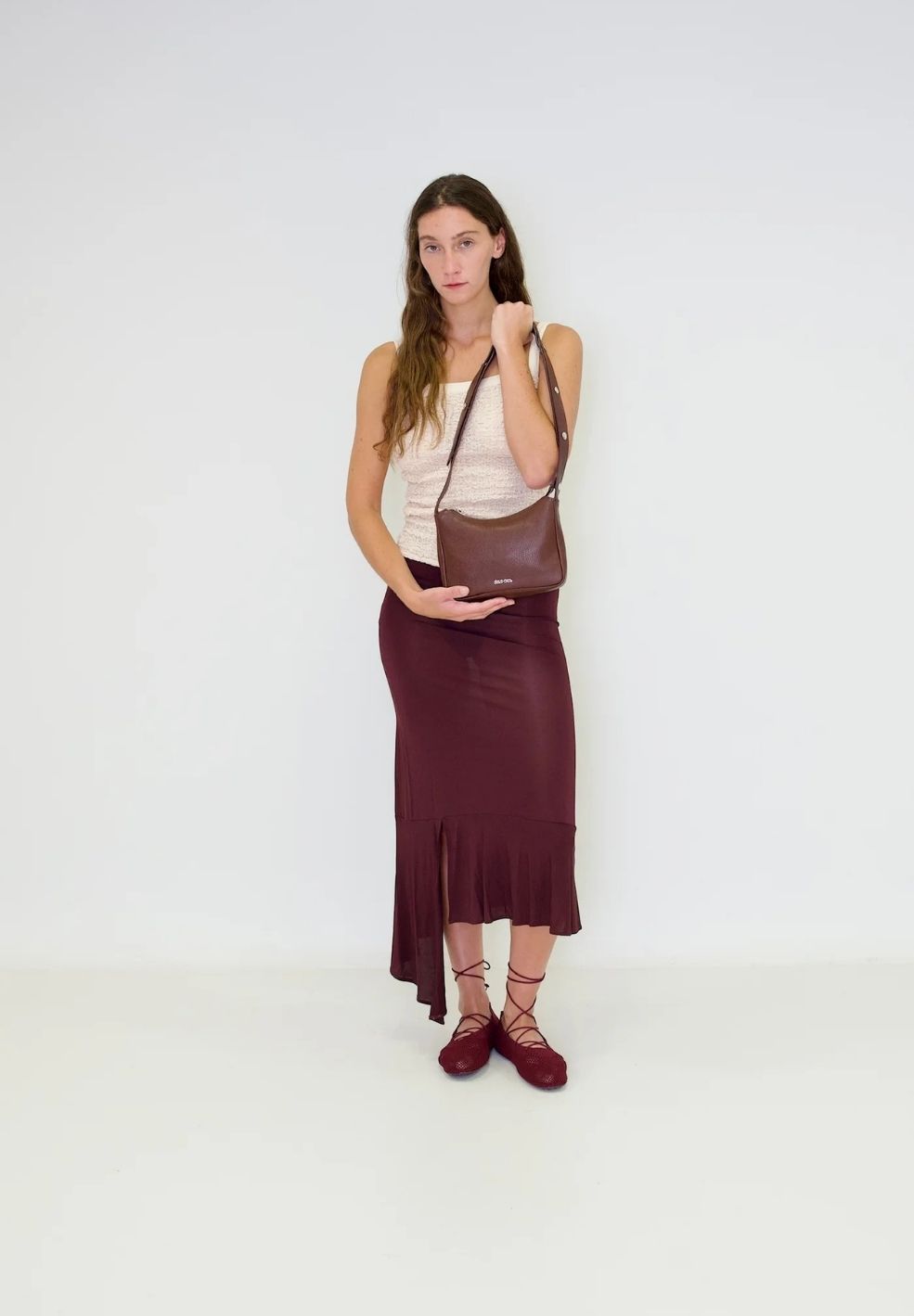 Tika Small Bag Brown from 100% nappa leather on model 2 | Verse Good Store
