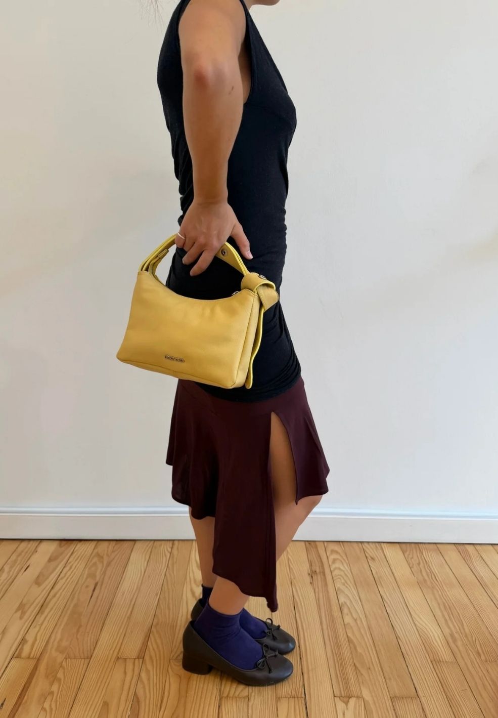 Tika Small Bag Butter from 100% nappa leather on model 2 | Verse Good Store
